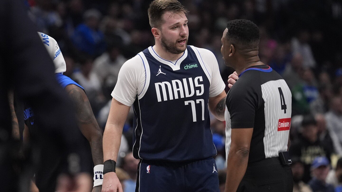 mavs-star-luka-doncic-will-be-out-about-a-month-before-check-on-calf-injury,-ap-source-says