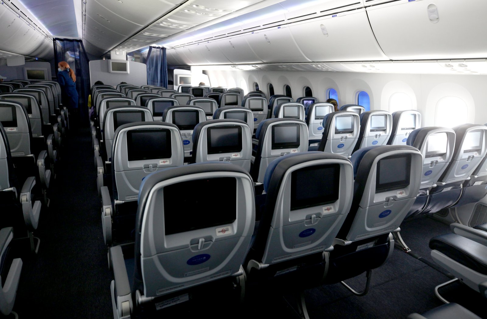 Many of the seats aboard a United Airlines flight sit empty on May 11, 2020 in flight to Houston, Texas from San Francisco.