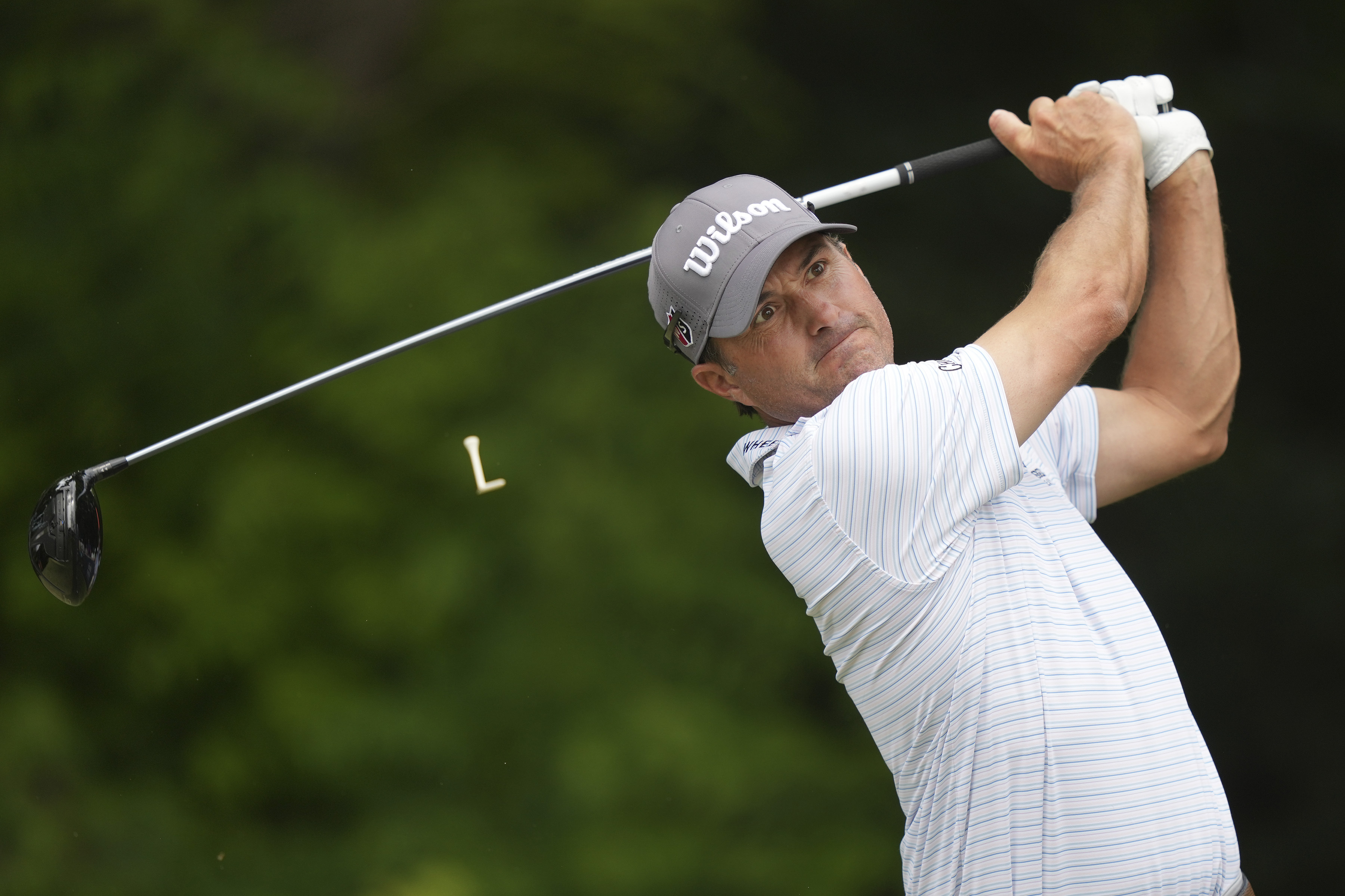 Kevin Kisner hits a tee shot on the sixth hole during the first round of the Charles Schwab Challenge golf tournament at the Colonial Country Club in Fort Worth, Texas, Thursday, May 25, 2023.
