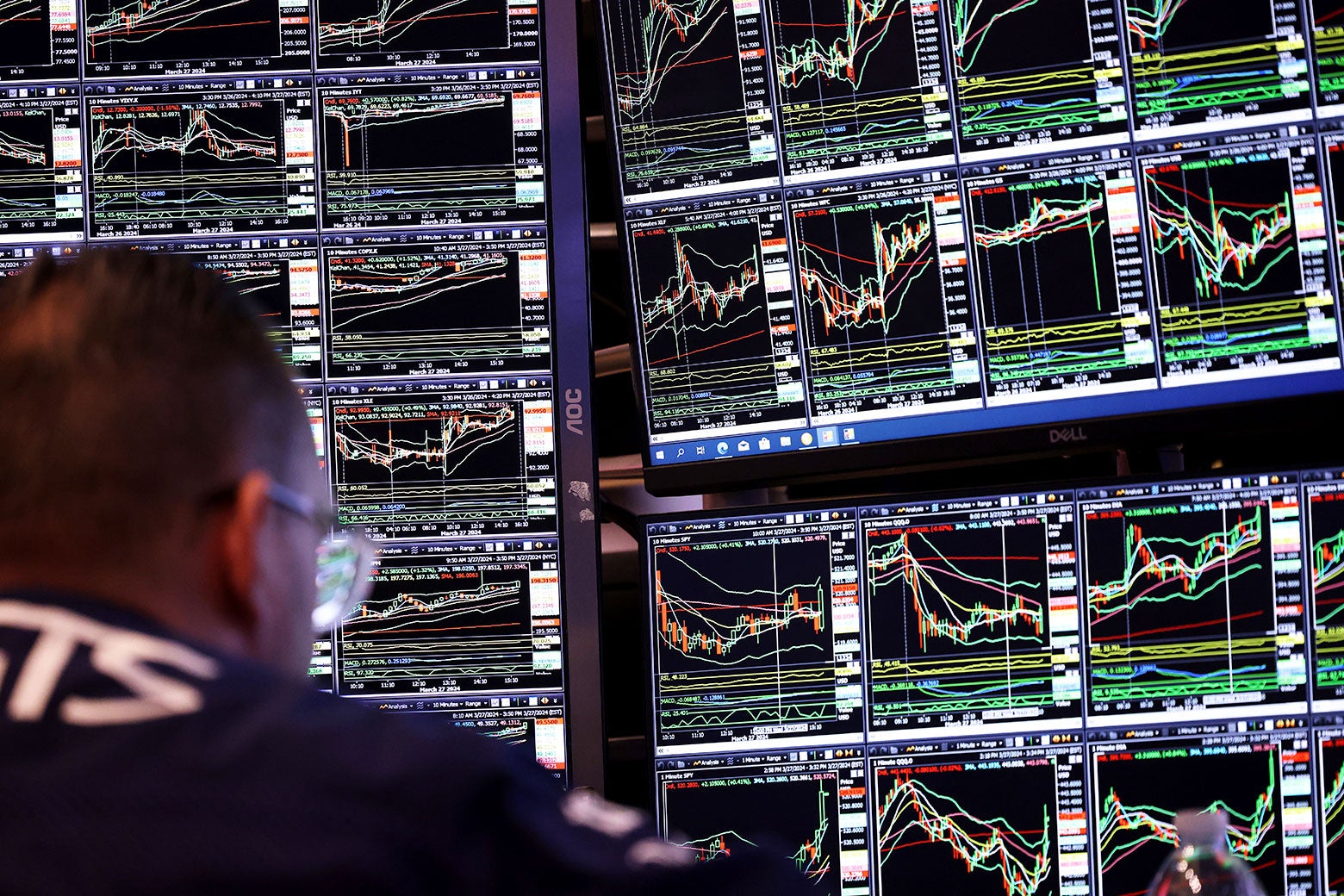 A bank of computers showing the stock market