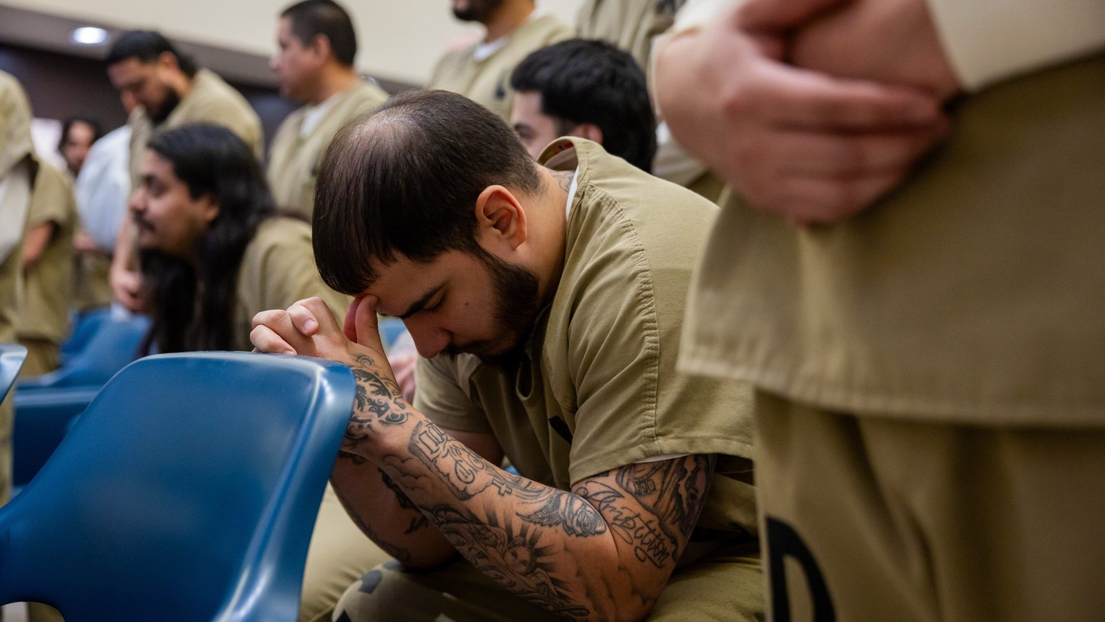 A Cook County Jail detainee attends Cardinal Blase J. Cupich's Christmas Day Mass at the jail on Dec. 25, 2024. (Tess Crowley/Chicago Tribune)