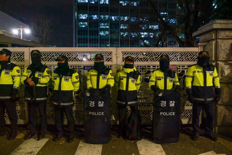 Police stand in front of the National Assembly in Seoul on Wednesday local time after President Yoon Suk Yeol declared martial law. Photo by Thomas Maresca/UPI
