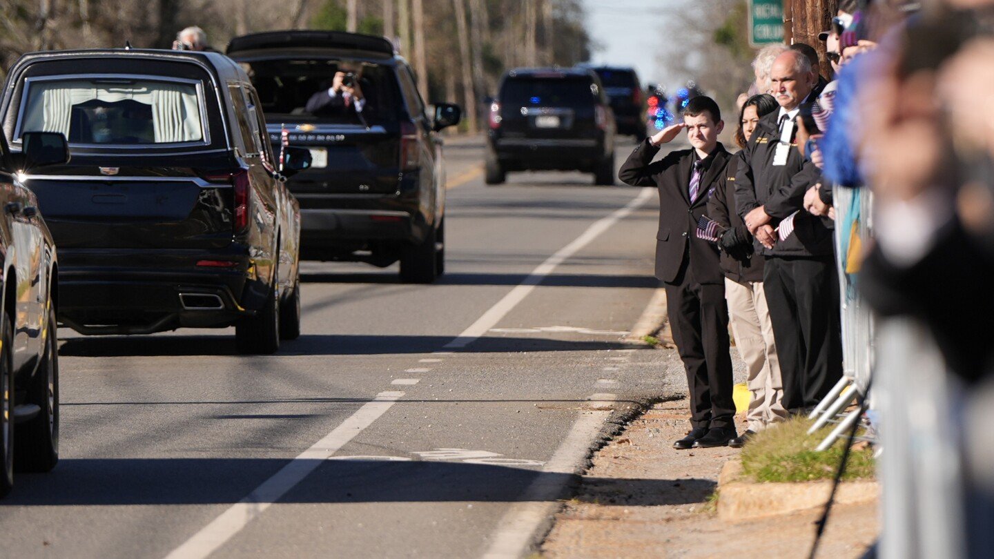 jimmy-carter’s-6-day-state-funeral-begins-with-a-motorcade-through-south-georgia