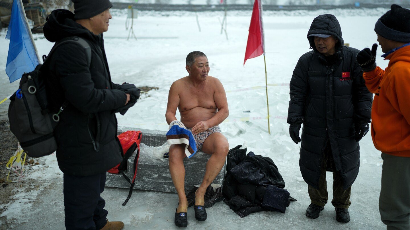 in-freezing-temperatures,-swimmers-in-china-plunge-into-a-river-for-health-and-joy