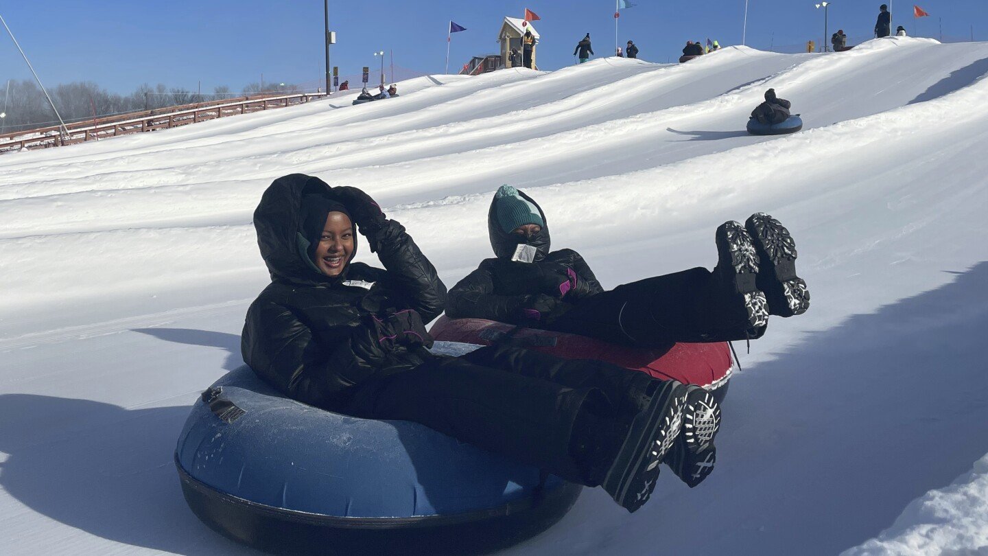 scarves-over-headscarves,-muslim-women’s-outdoors-group-tackles-snow-tubing-in-minnesota