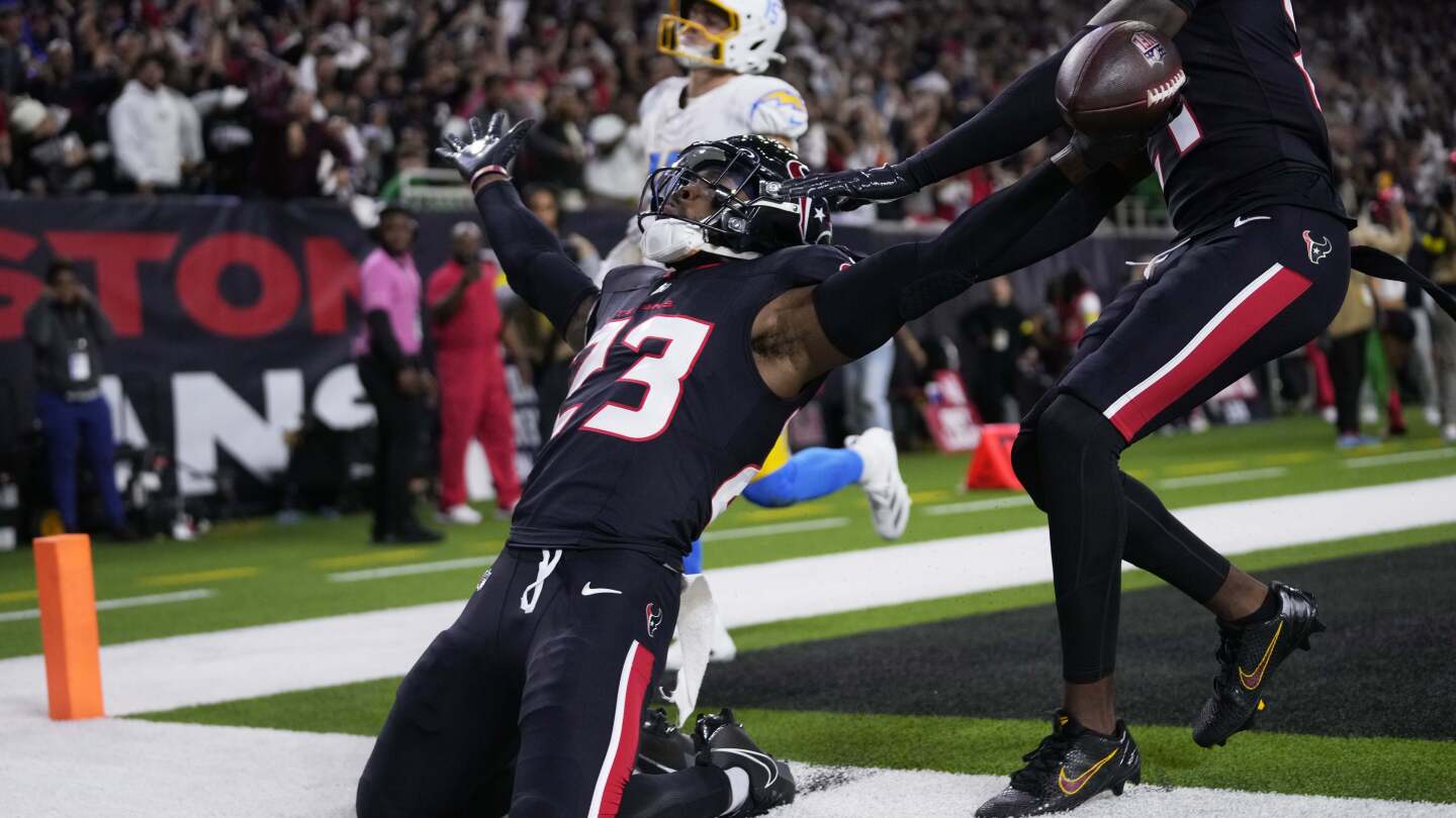 texans-intercept-herbert-a-career-high-4-times-in-a-32-12-win-over-chargers-in-wild-card-playoff