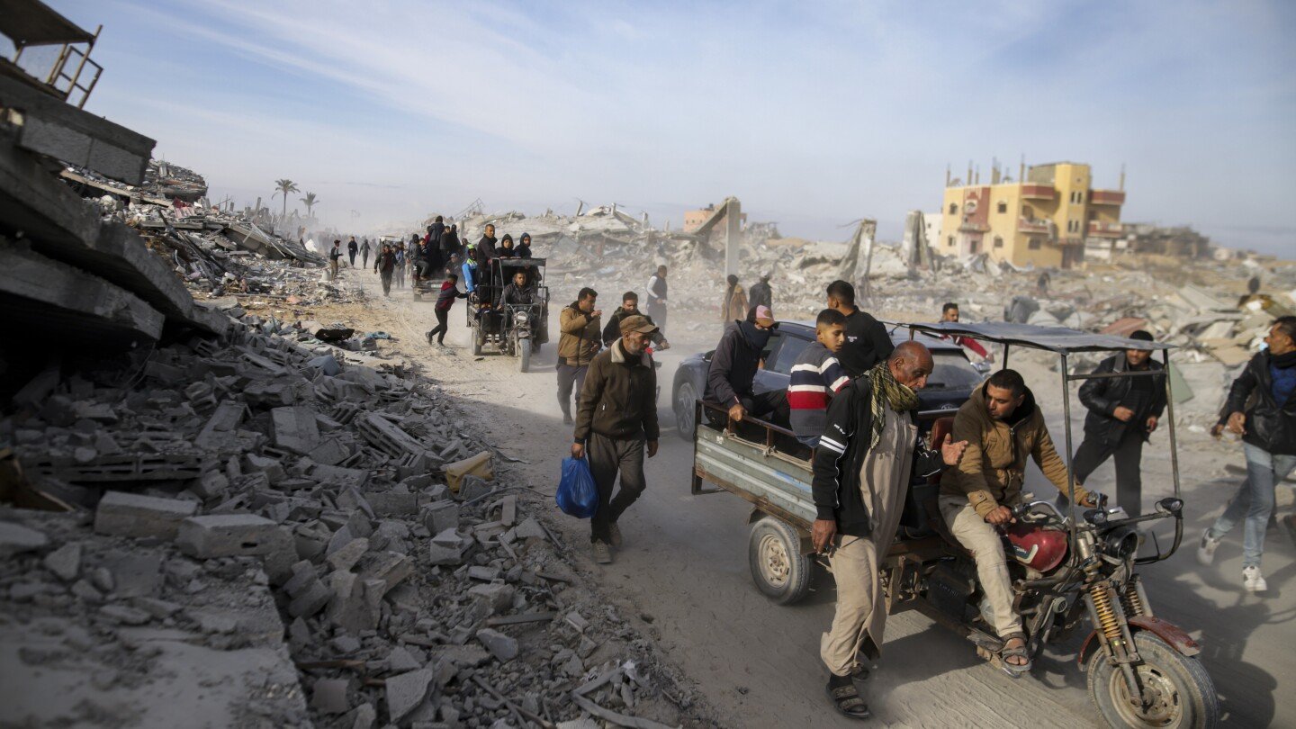 palestinians-trek-across-rubble-to-return-to-their-homes-as-gaza-ceasefire-takes-hold