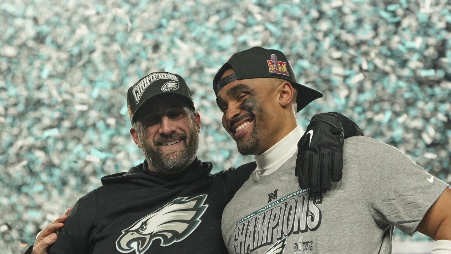 hurts,-barkley-each-rush-for-3-tds-to-help-eagles-reach-super-bowl-with-55-23-win-over-washington