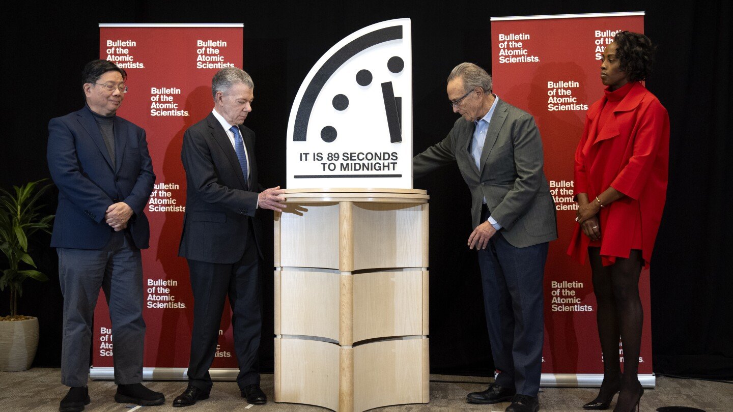 ‘doomsday-clock’-moves-closer-to-midnight-amid-threats-of-climate-change,-nuclear-war,-pandemics,-ai
