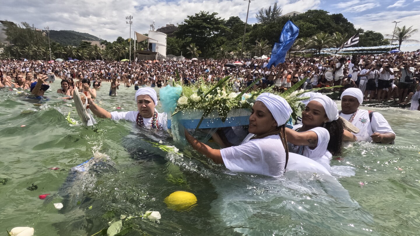 devotees-pay-homage-to-afro-brazilian-sea-goddess-on-rio-de-janeiro-beach