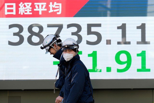 stock-market-today:-asian-shares-trade-mixed-after-wall-street-slumps-on-trump-tariff-worries