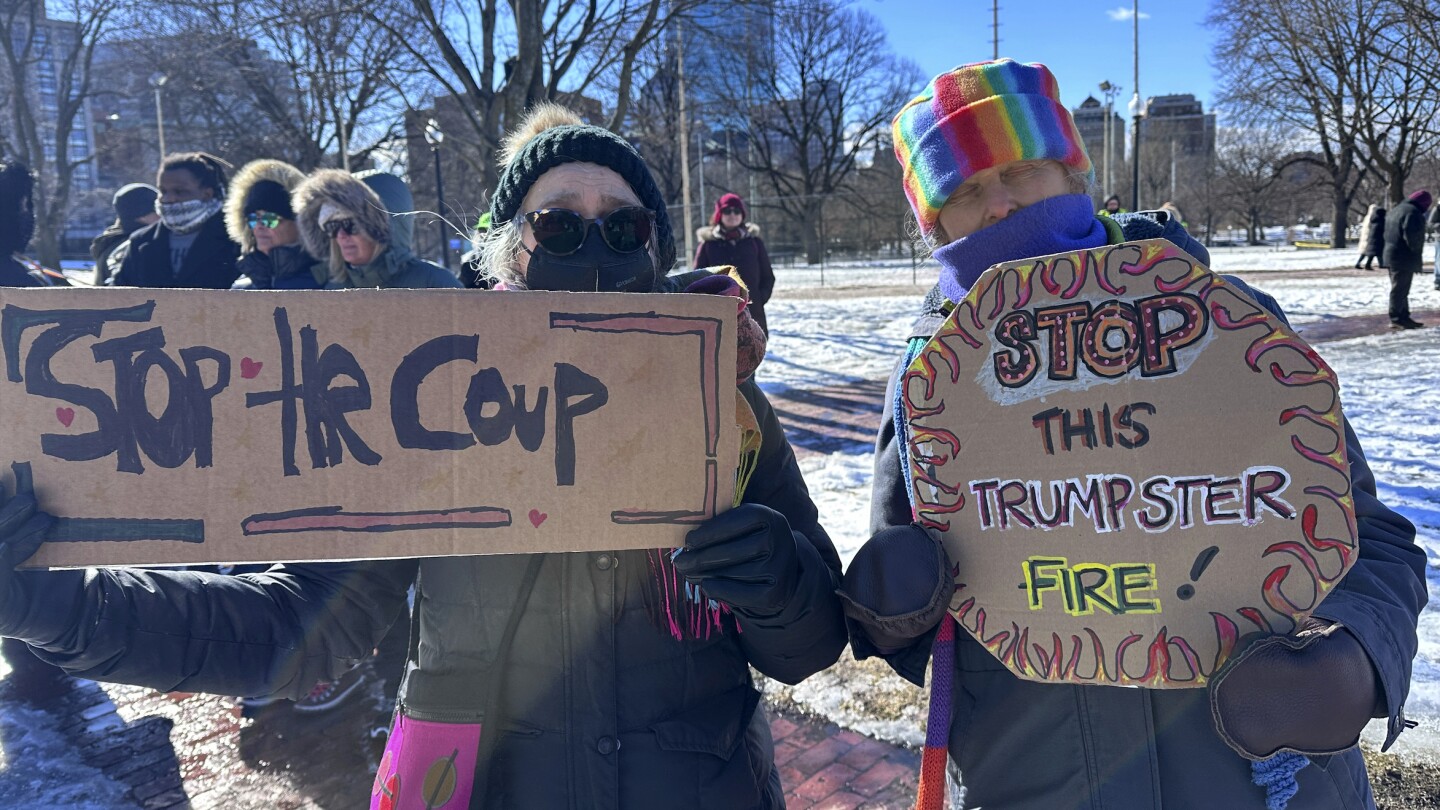 hundreds-march-in-boston-to-support-democracy-and-protest-policies-of-trump,-musk