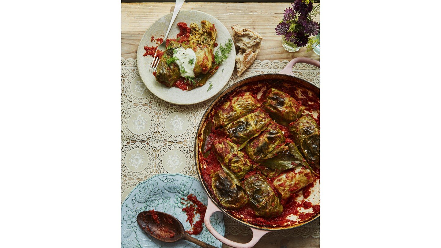 a-recipe-from-‘kapusta’:-cabbage-rolls-with-sauerkraut-leaves,-beef-and-rice-in-a-tomato-sauce