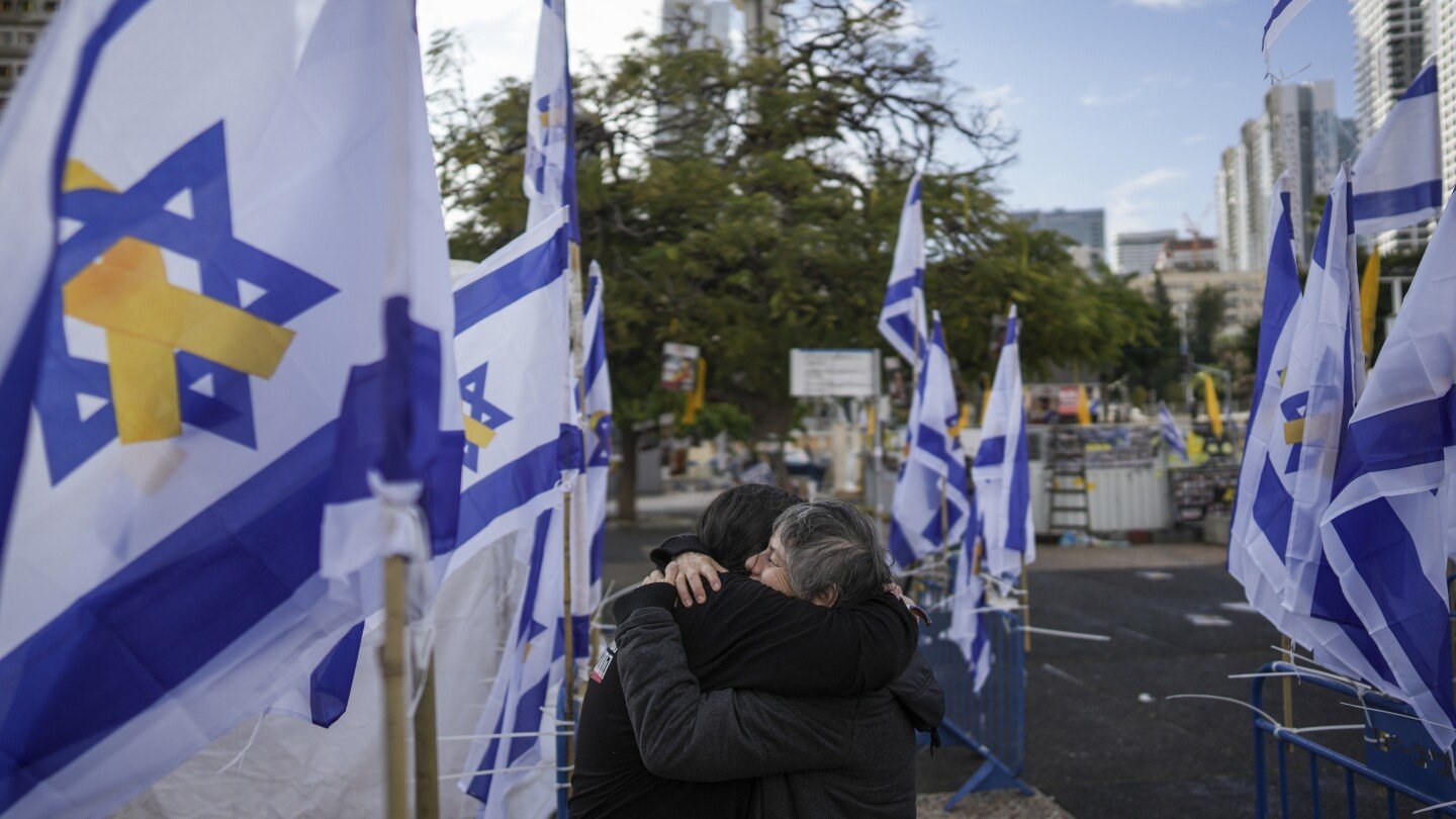 middle-east-latest:-israel-receives-remains-said-to-include-a-mother-and-her-2-young-children