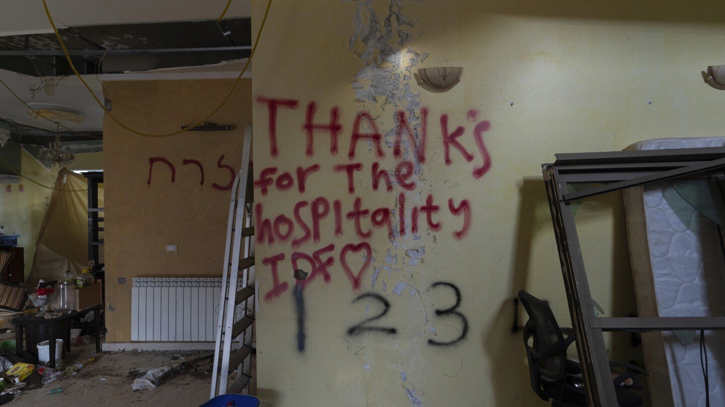 ap-photos:-graffiti-left-by-israeli-soldiers-turn-south-lebanon-homes-into-a-canvas-of-war
