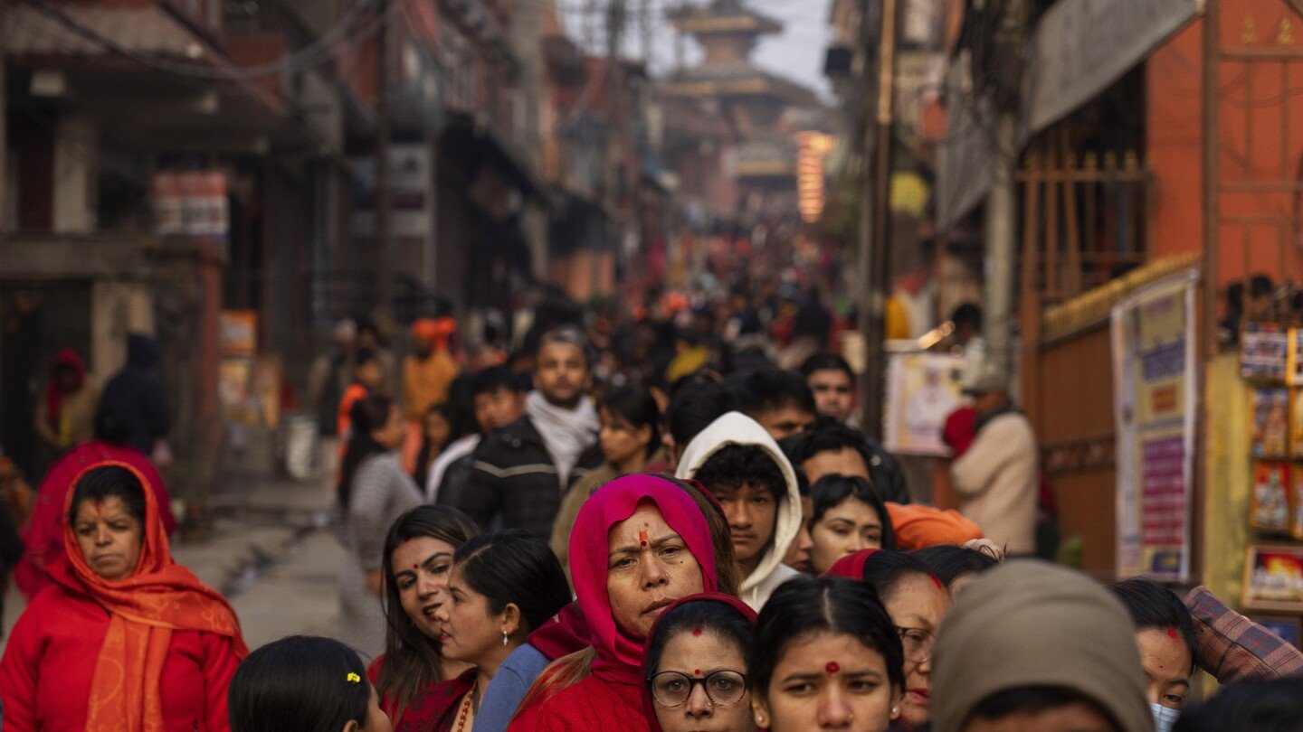 tens-of-thousands-gather-for-hindu-festival-at-nepal-temple,-with-many-lighting-up-marijuana-joints