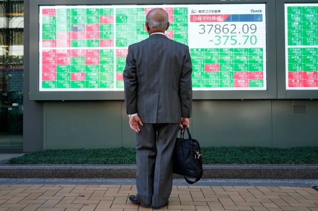 stock-market-today:-world-shares-are-mixed-after-slight-gains-on-wall-street