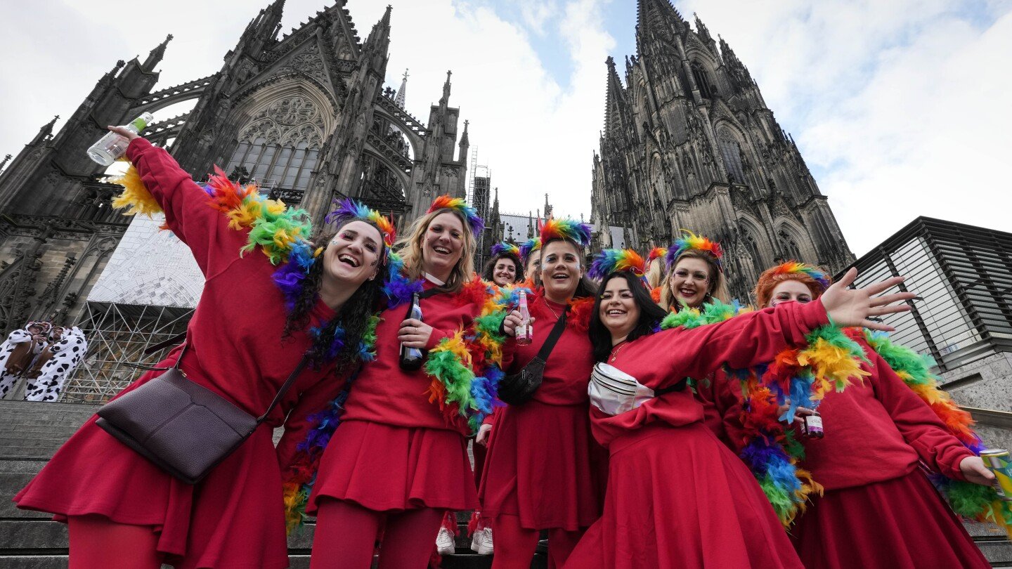 carnival’s-women-revelers-take-over-the-rhineland-for-a-day,-dancing,-drinking-and-kissing