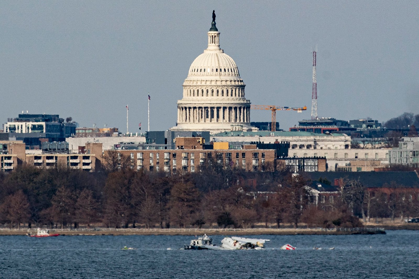 Emergency response units work at the crash site of the American Airlines plane on the Potomac River after the plane crashed last night on approach to Reagan National Airport on Jan. 30, 2025 in Arlington, Virginia.