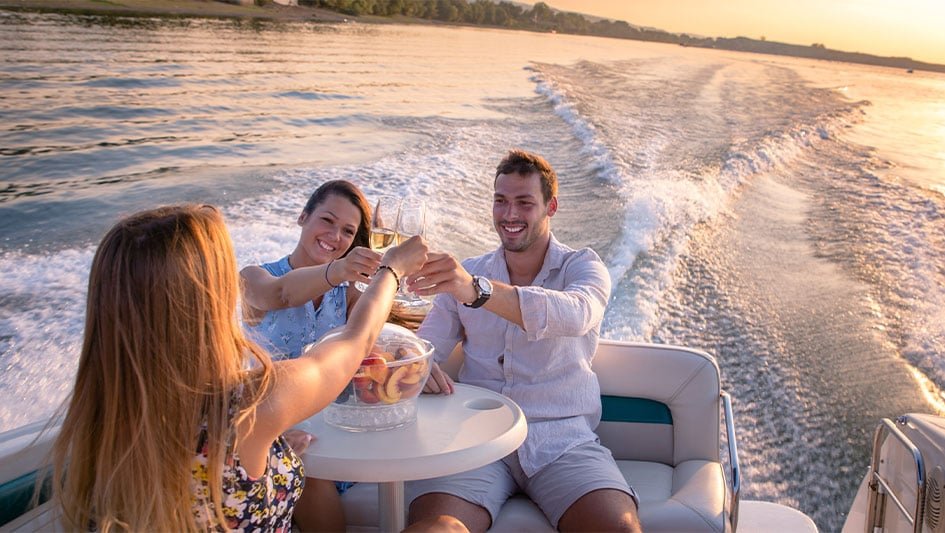 Wealthy toast on boat