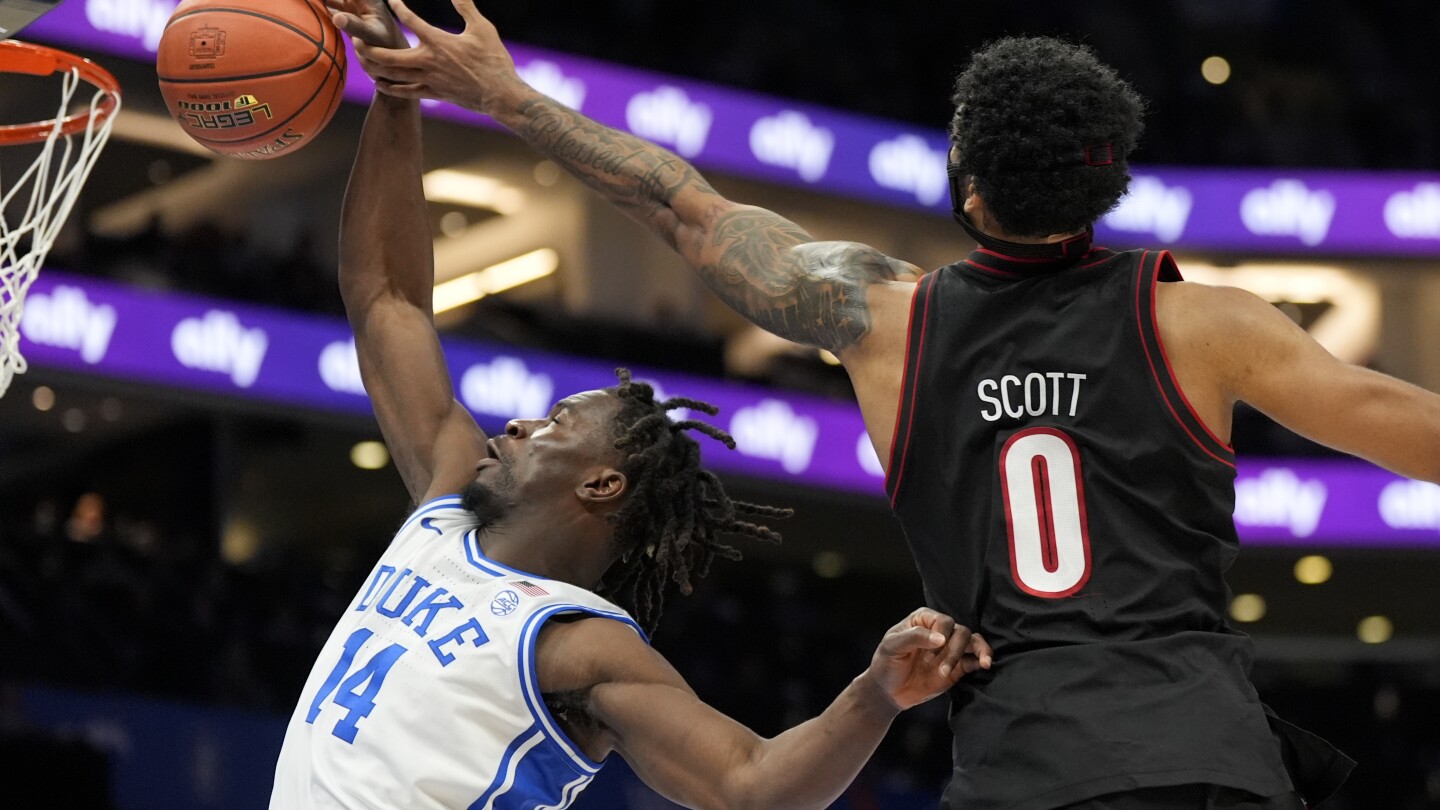proctor,-knueppel-carry-no-1-duke-past-no.-13-louisville-73-62-for-2nd-acc-title-in-3-years