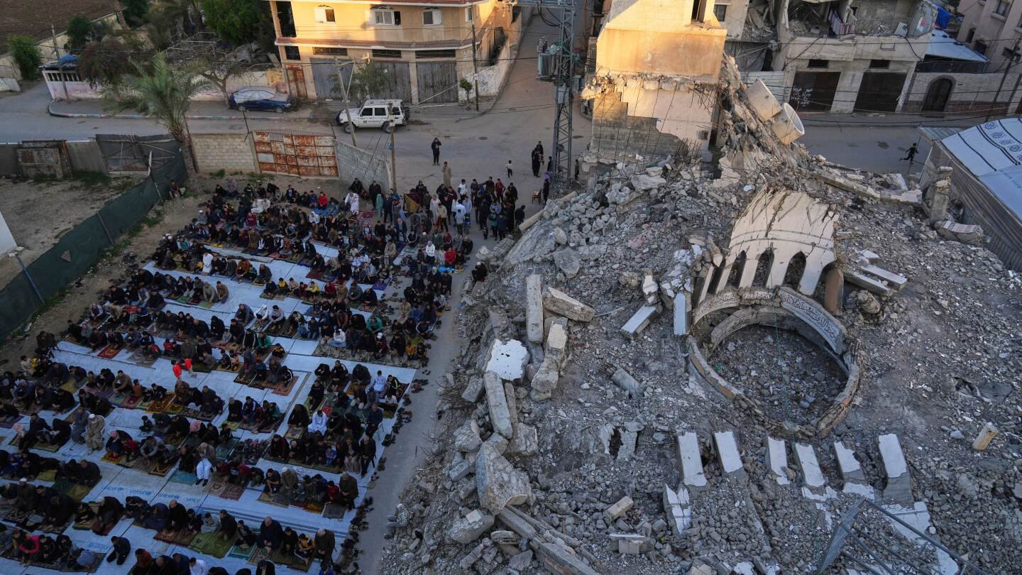 ‘eid-of-sadness’:-palestinians-in-gaza-mark-muslim-holiday-with-dwindling-food-and-no-end-to-war