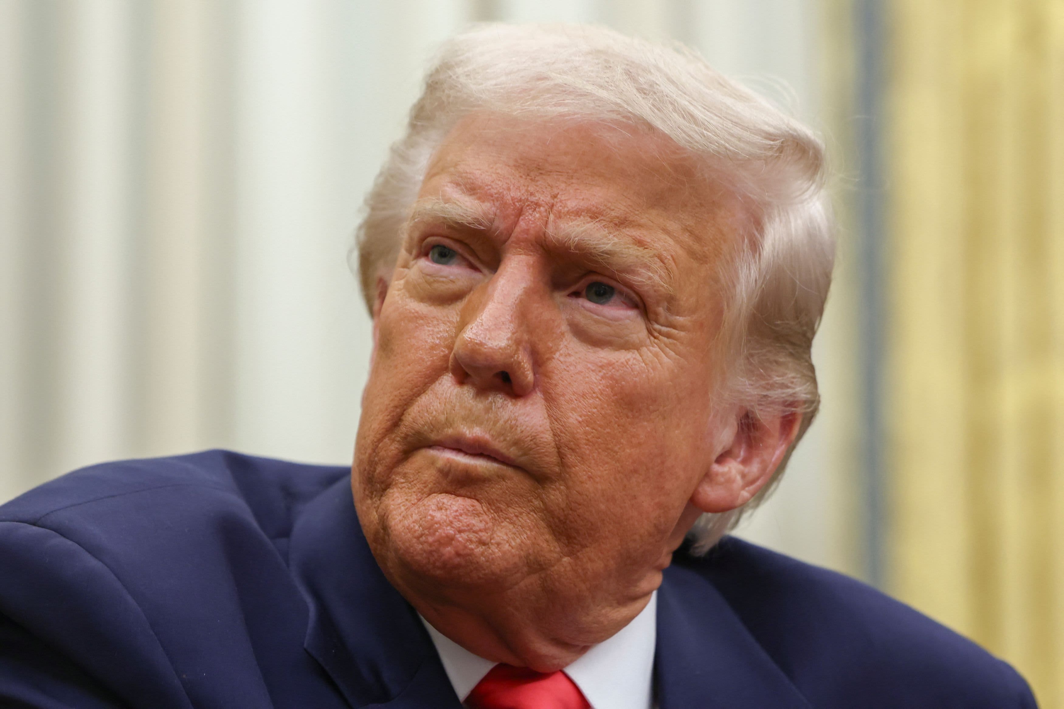 U.S. President Donald Trump looks on in the Oval Office, on the day he signs executive orders, at the White House in Washington, D.C., U.S. March 6, 2025. 