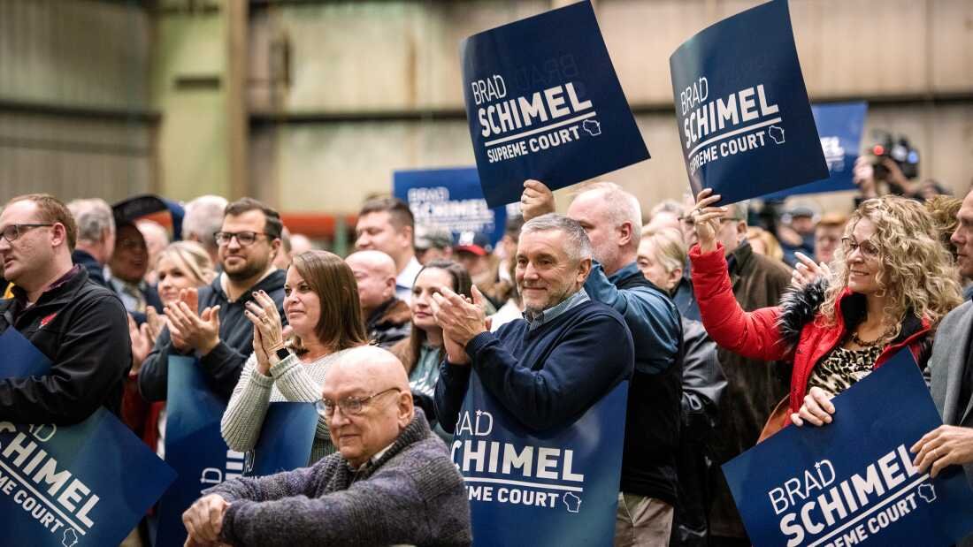Attendees applaud as Brad Schimel announces his run for Wisconsin State Supreme Court on Thursday, Nov. 30, 2023, in Waukesha, Wis.