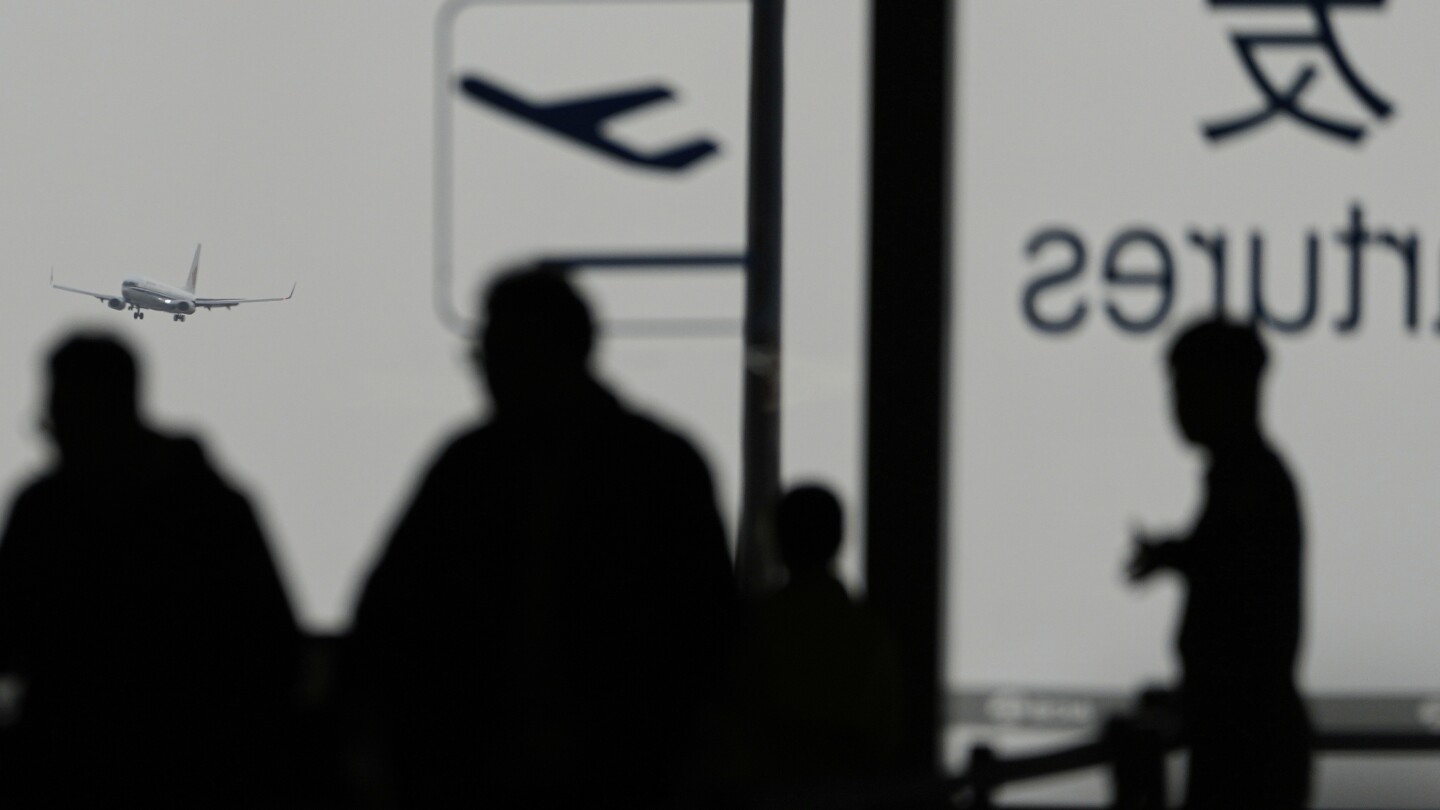 high-winds-and-sandstorms-prompt-beijing-to-cancel-hundreds-of-flights-and-close-parks