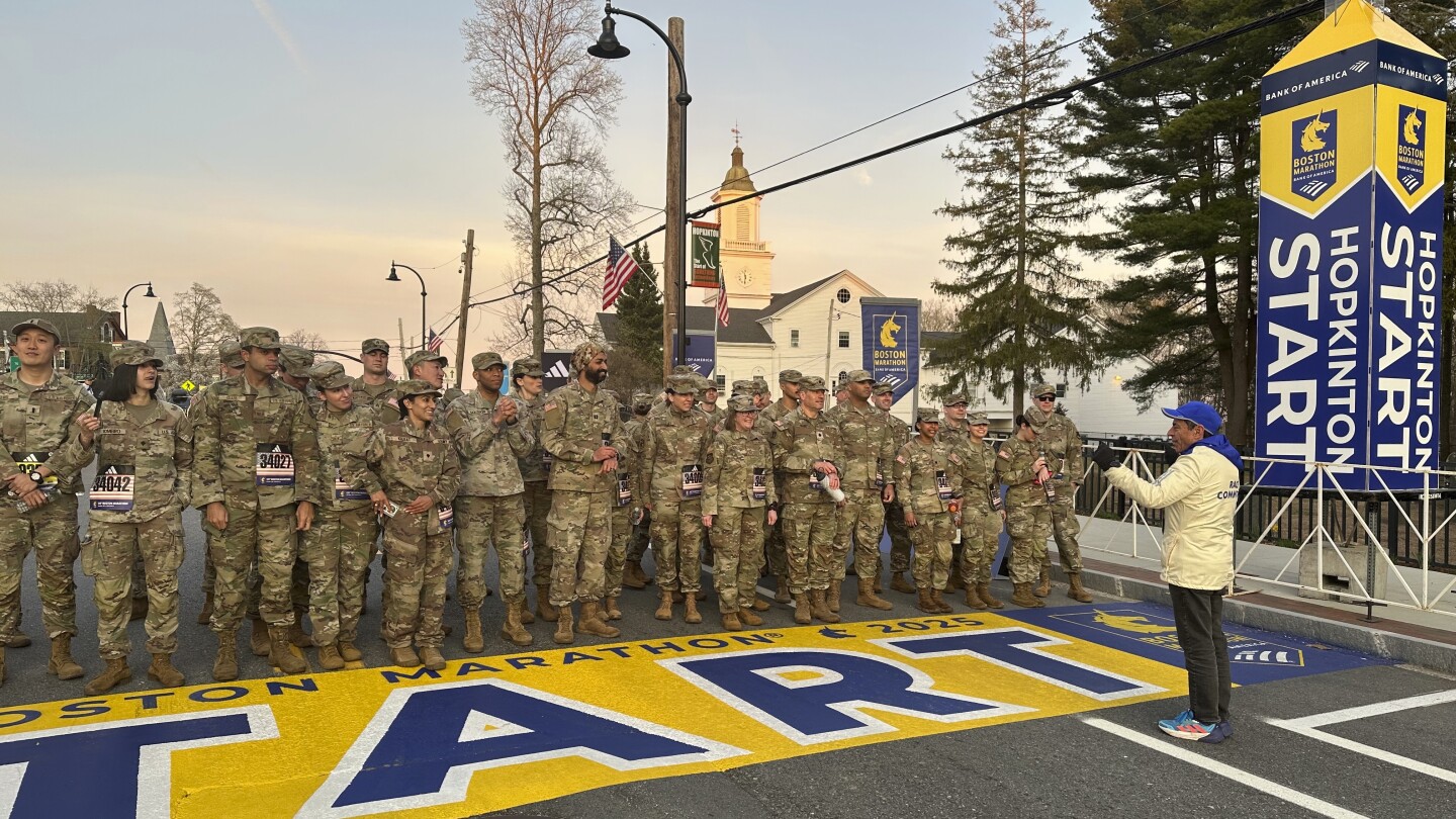 military-marchers-set-out-from-hopkinton-to-start-the-129th-boston-marathon