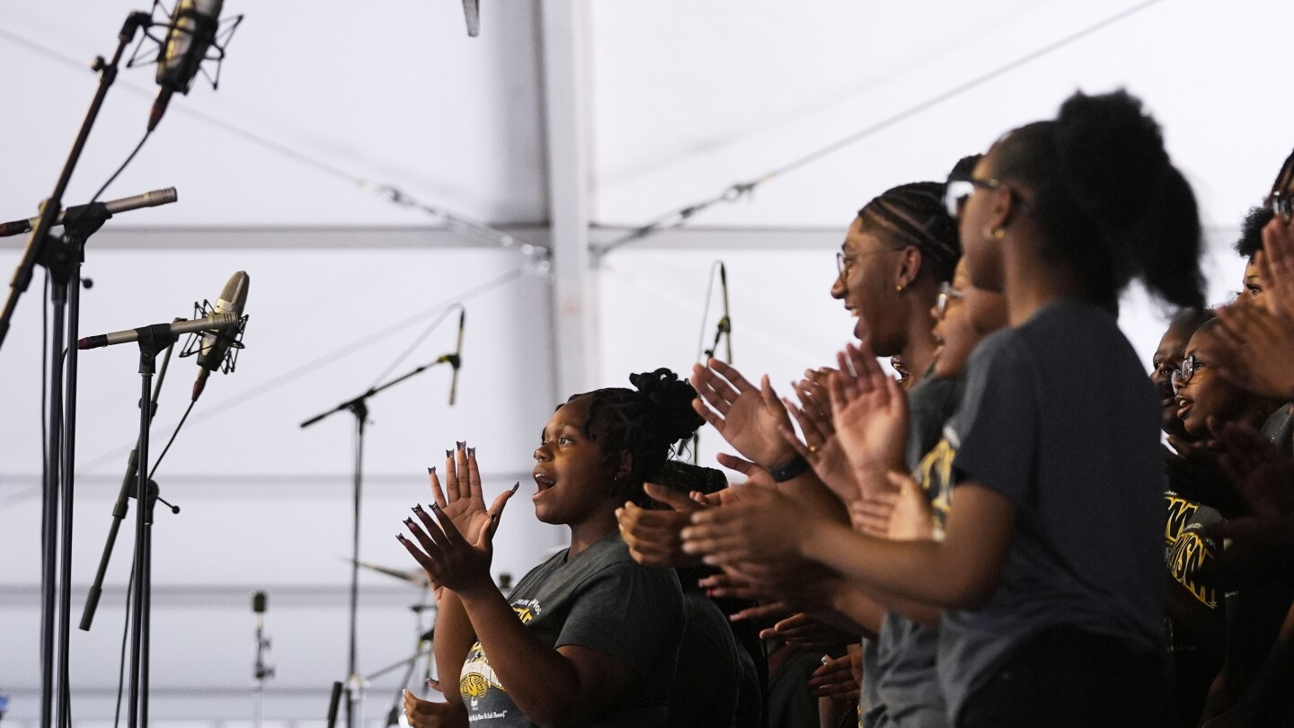 student-gospel-singers-take-stage-at-new-orleans-festival-known-for-celebrity-acts