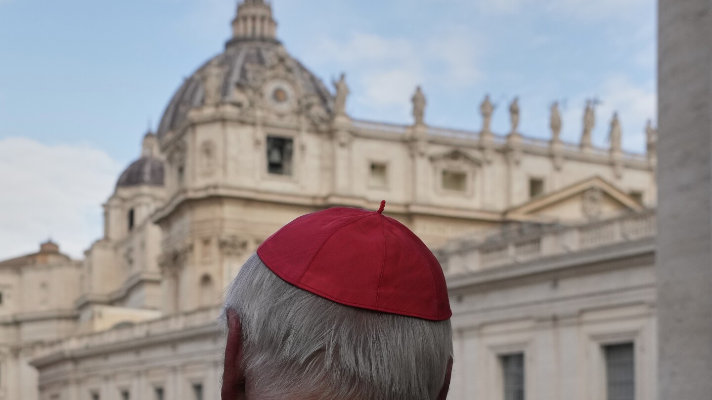 journalists-swarm-cardinals-at-the-vatican-gates-as-they-meet-to-plan-a-conclave