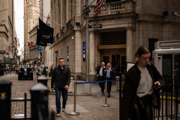 People walking outside the New York Stock Exchange.