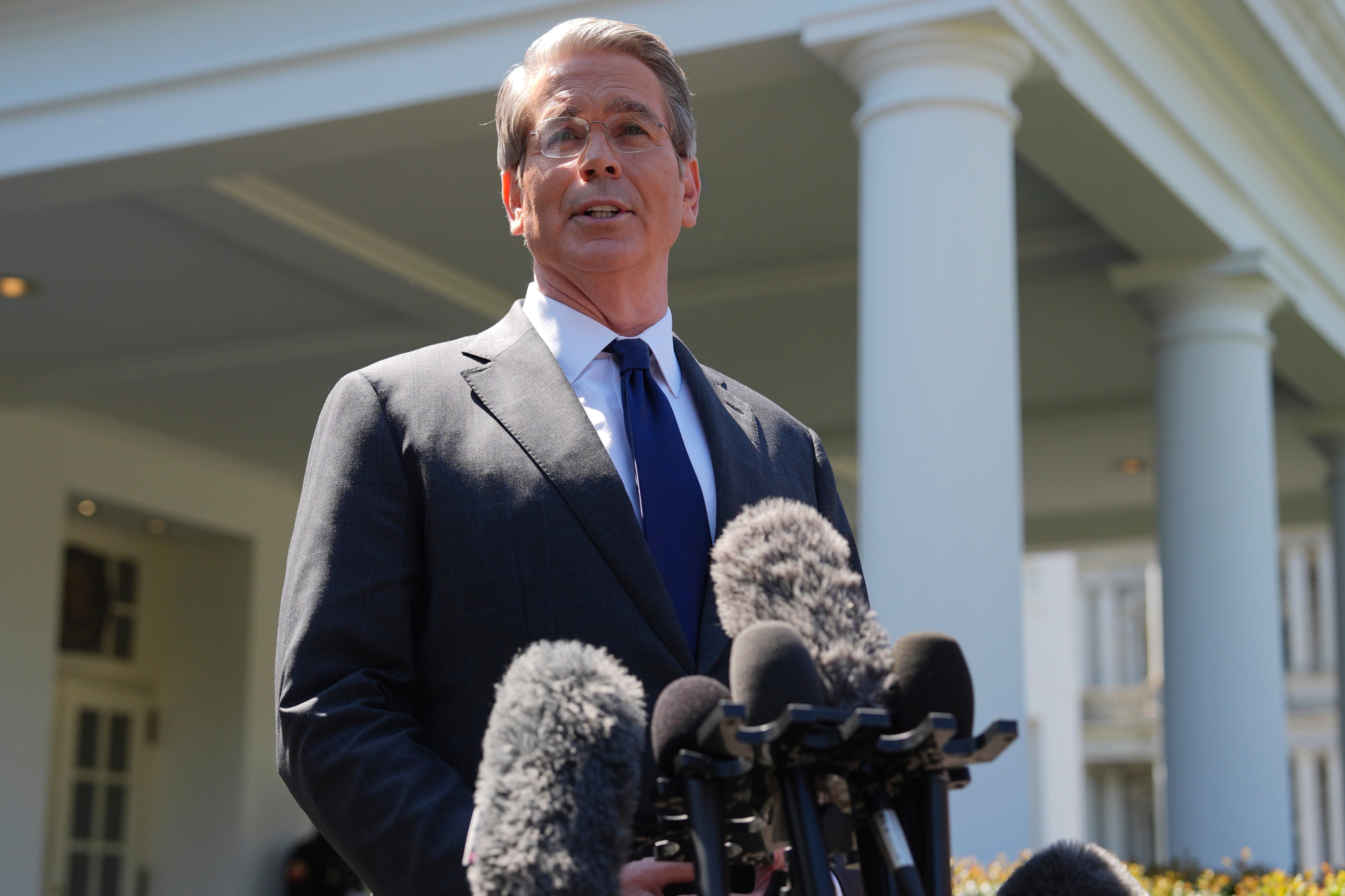 Treasury Secretary Scott Bessent speaks to reporters outside the West Wing of the White House on April 9, 2025, in Washington.