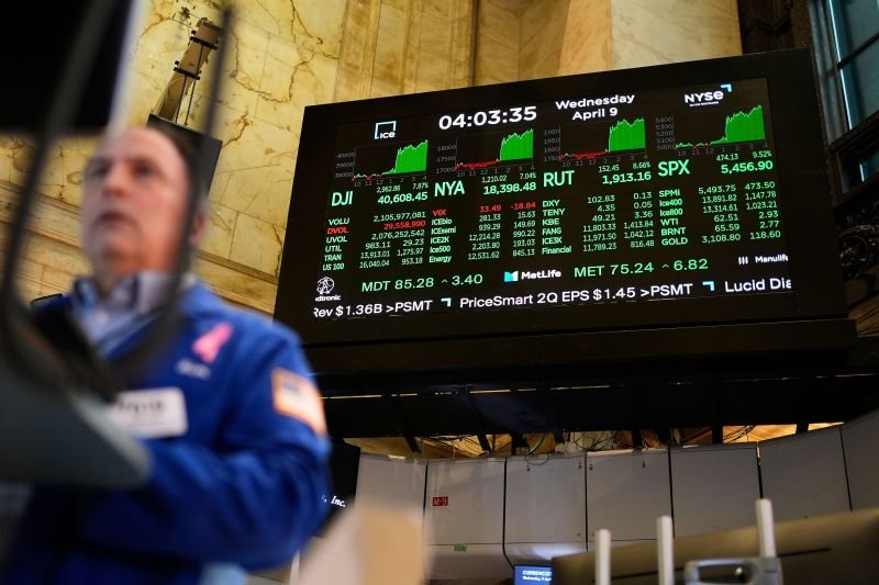 Stocks turned positive Wednesday after five straight sessions of losses that wiped out $6 trillion in market value. (AP Photo/Seth Wenig)