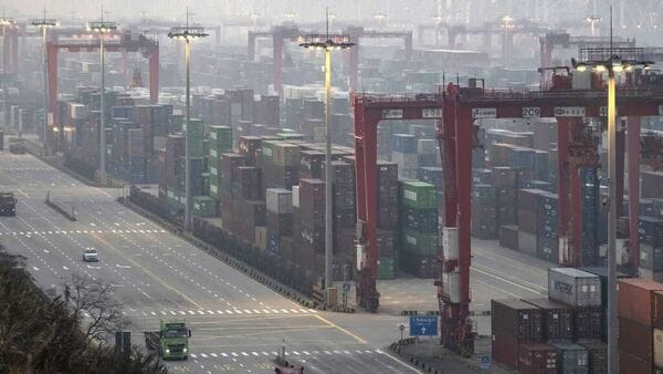 Gantry cranes and shipping containers at the Yangshan Deepwater Port in Shanghai, China. (Qilai Shen/Bloomberg) Gantry cranes and shipping containers at the Yangshan Deepwater Port in Shanghai, China. (Qilai Shen/Bloomberg)