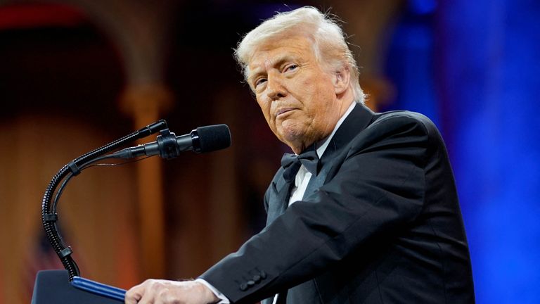 U.S. President Donald Trump attends the National Republican Congressional Committee (NRCC) dinner at the National Building Museum in Washington, D.C., U.S., April 8, 2025. REUTERS/Nathan Howard