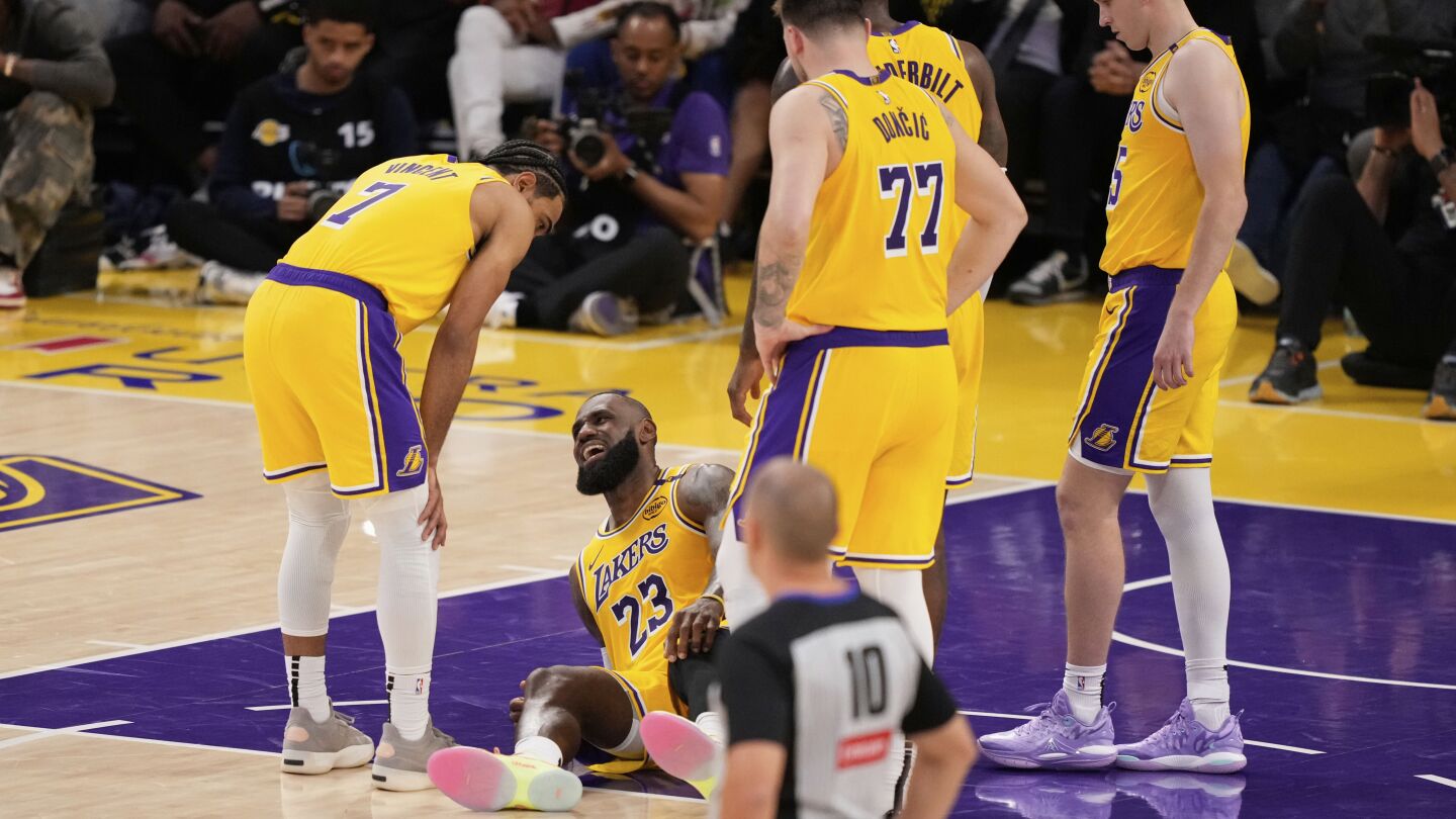 lebron-james-sprained-a-knee-ligament-in-lakers’-final-loss-to-wolves,-an-ap-source-says