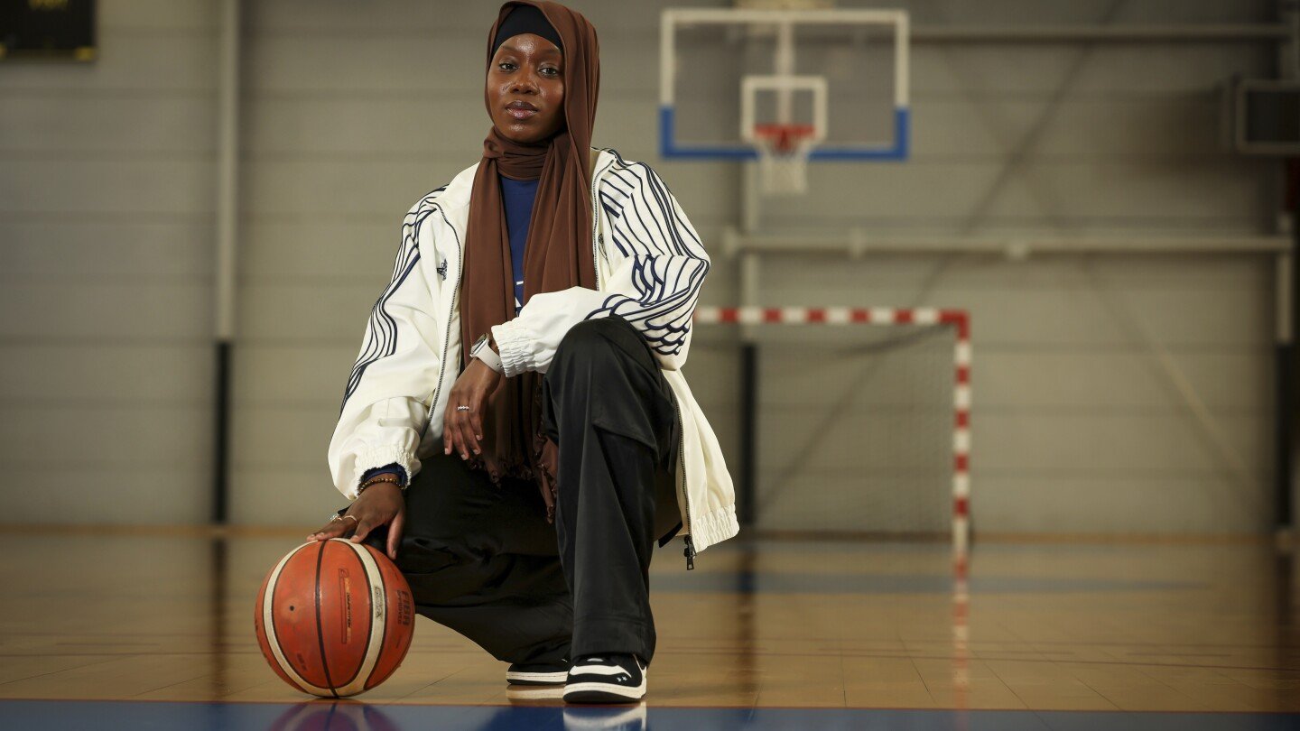 ap-photos:-a-new-bill-banning-headscarves-could-keep-athletes-off-the-court