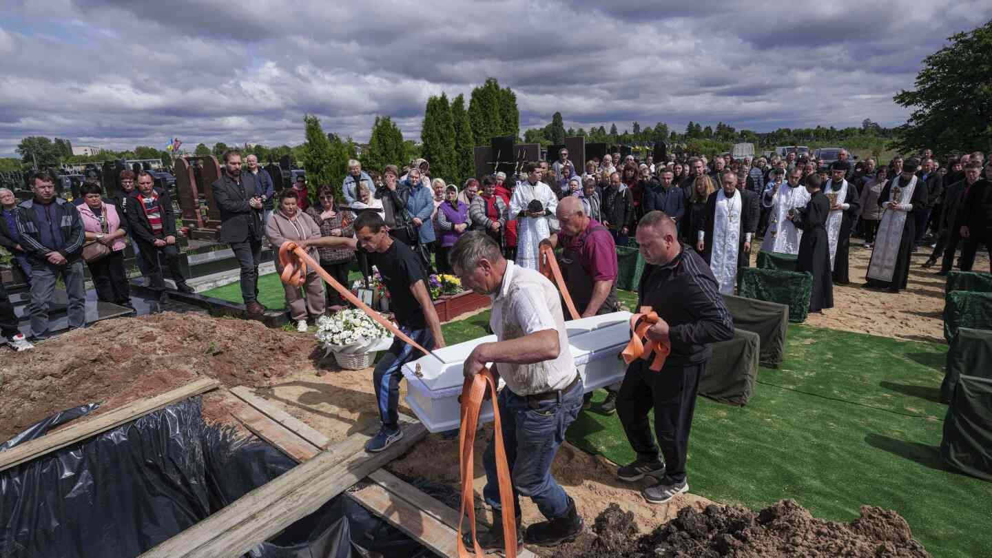 funeral-of-3-siblings-killed-in-russian-strike-underscores-mounting-toll-on-ukrainian-families