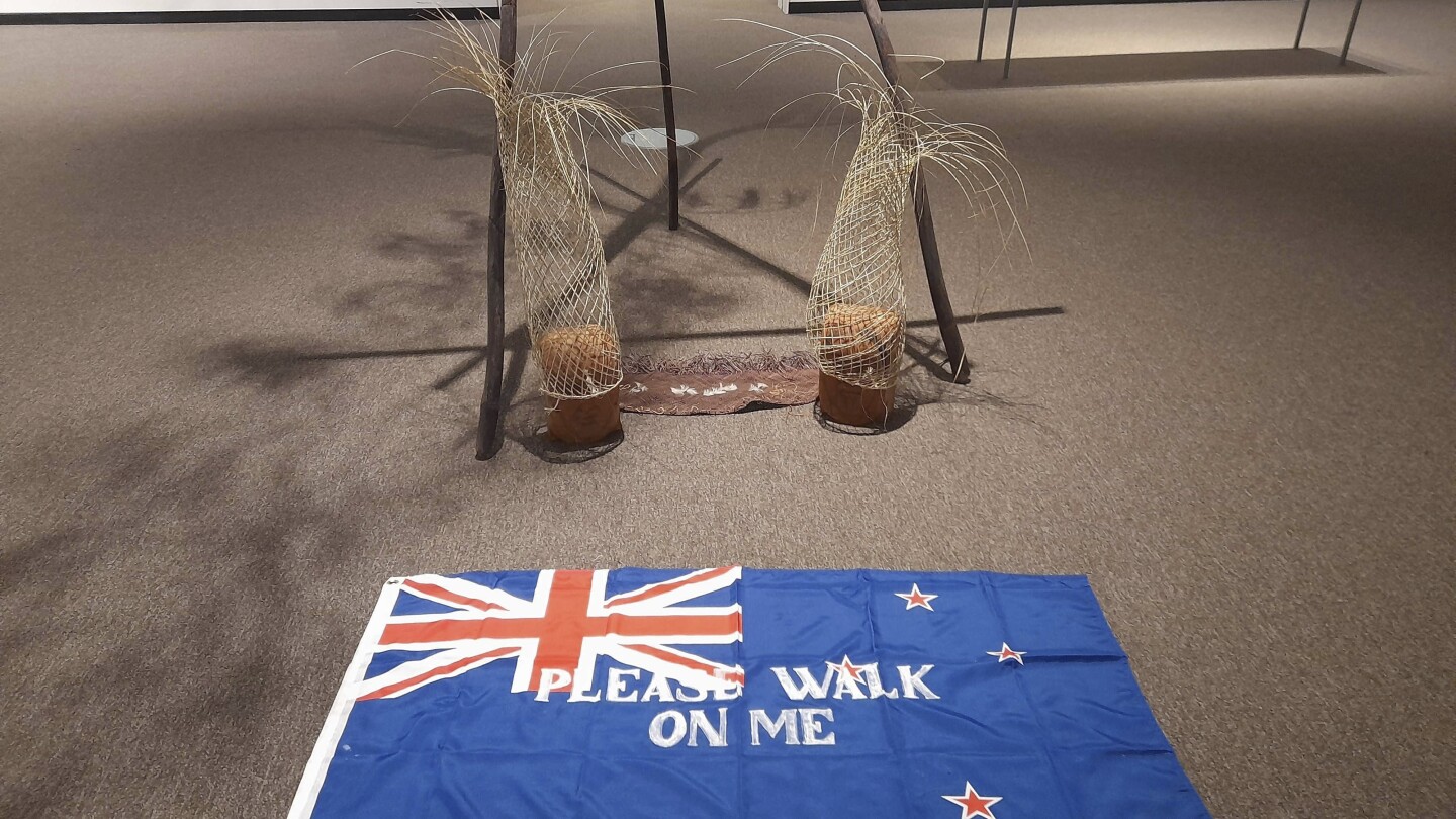 protests-over-‘please-walk-on-me’-flag-artwork-prompt-its-removal-from-new-zealand-gallery