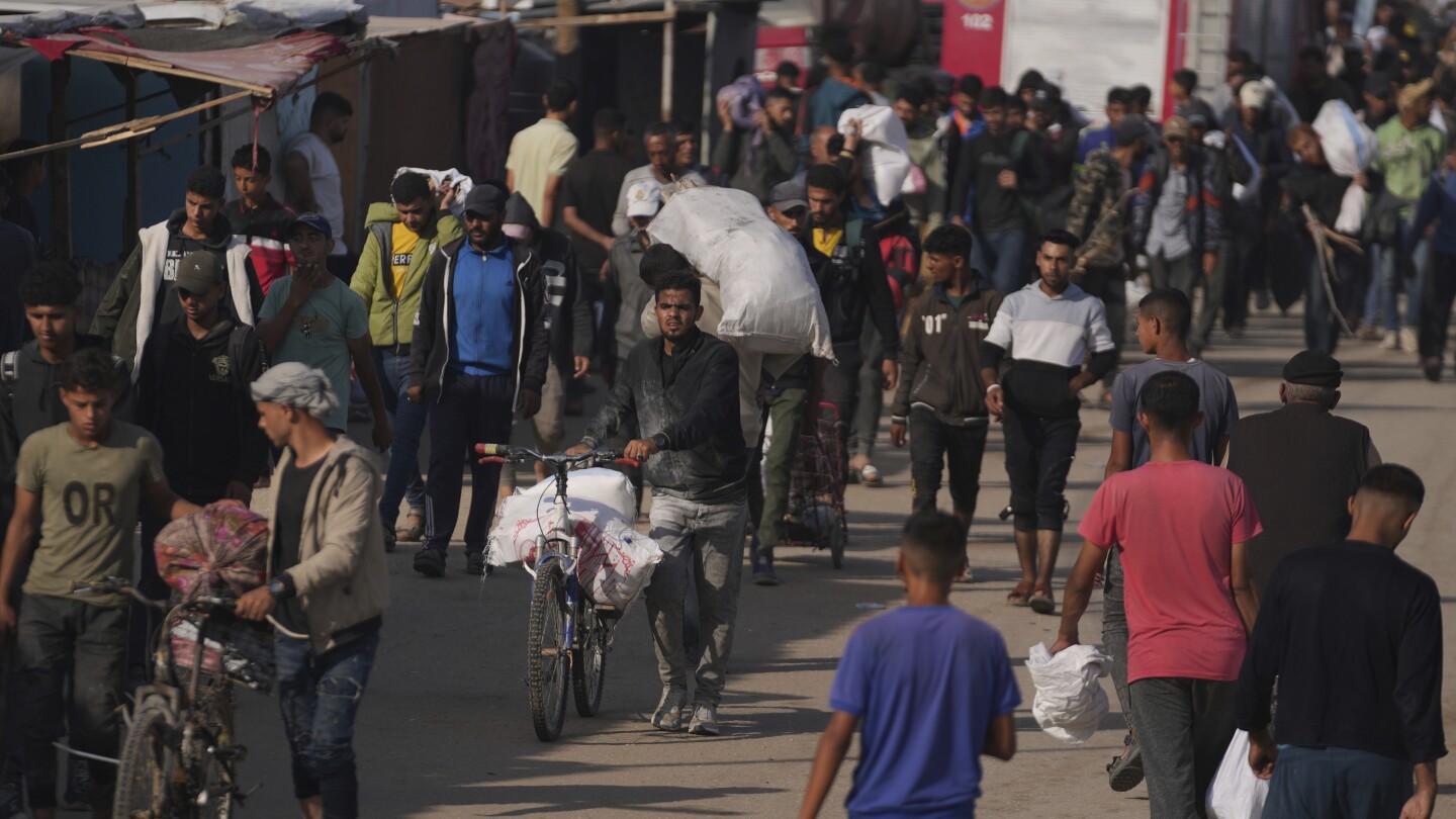 at-least-21-palestinians-killed-while-heading-to-gaza-aid-hub,-hospital-says