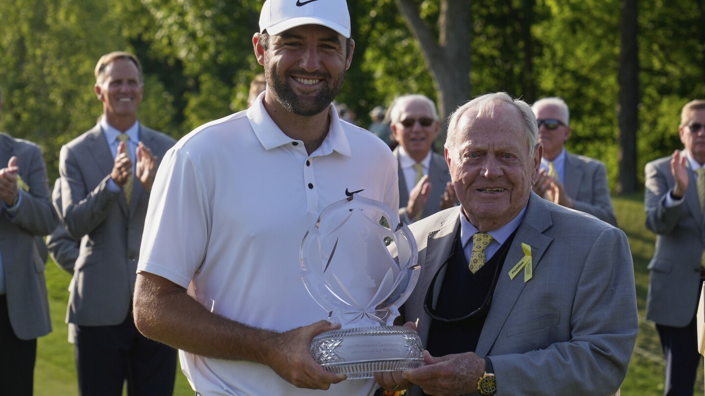 scottie-scheffler-joins-tiger-woods-as-only-repeat-winners-at-memorial