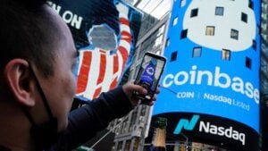 The Coinbase logo covers the Nasdaq MarketSite in New York's Times Square, April 14, 2021.