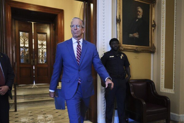 Senate Majority Leader John Thune, R-S.D., strides from the chamber after speaking about the reconciliation process to advance President Donald Trump's spending and tax bill, at the Capitol in Washington, Tuesday, June 3, 2025. (AP Photo/J. Scott Applewhite)