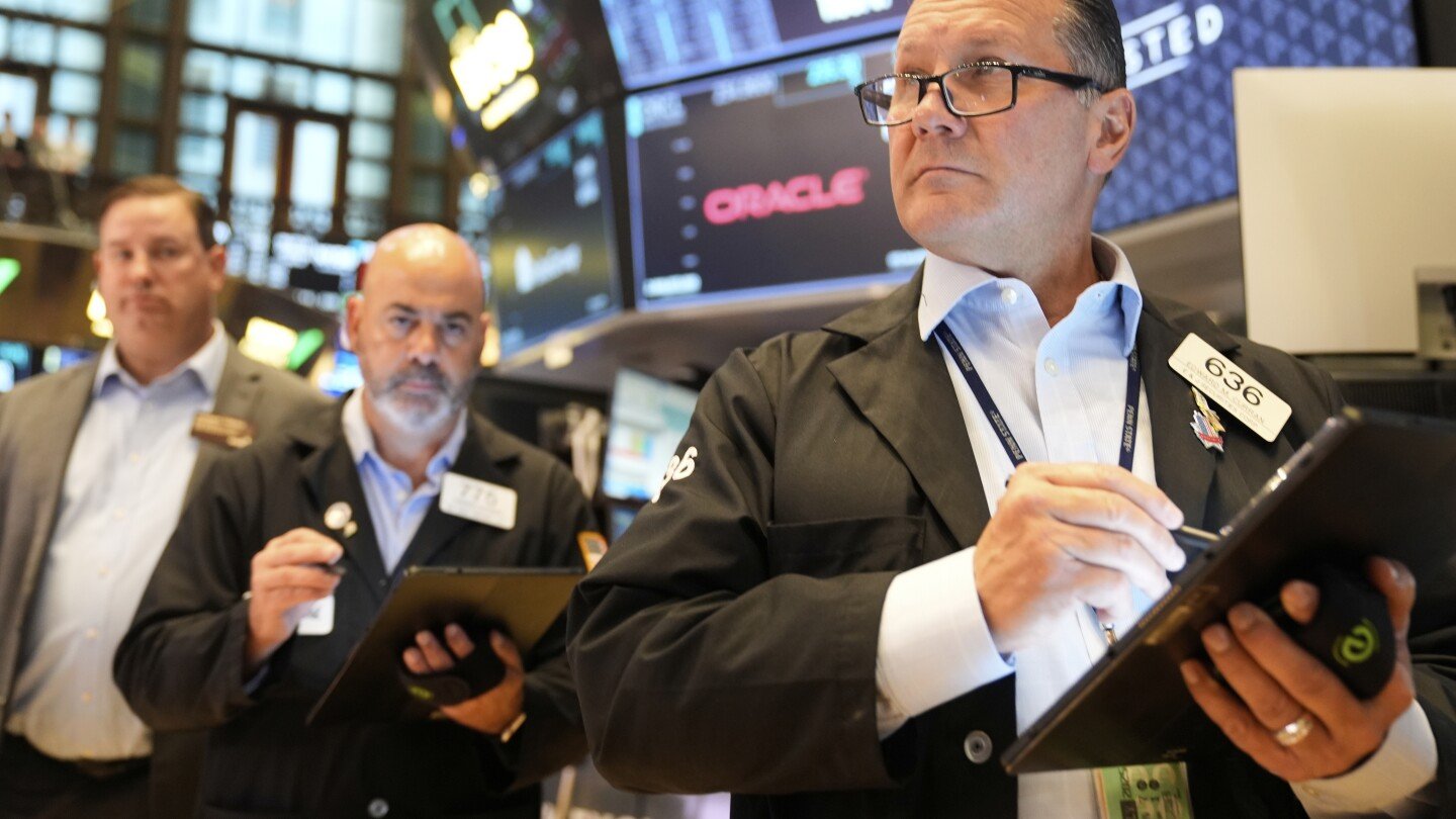asian-shares-are-mixed-after-nvidia-nudges-nasdaq-to-a-record,-while-other-us-stocks-slump
