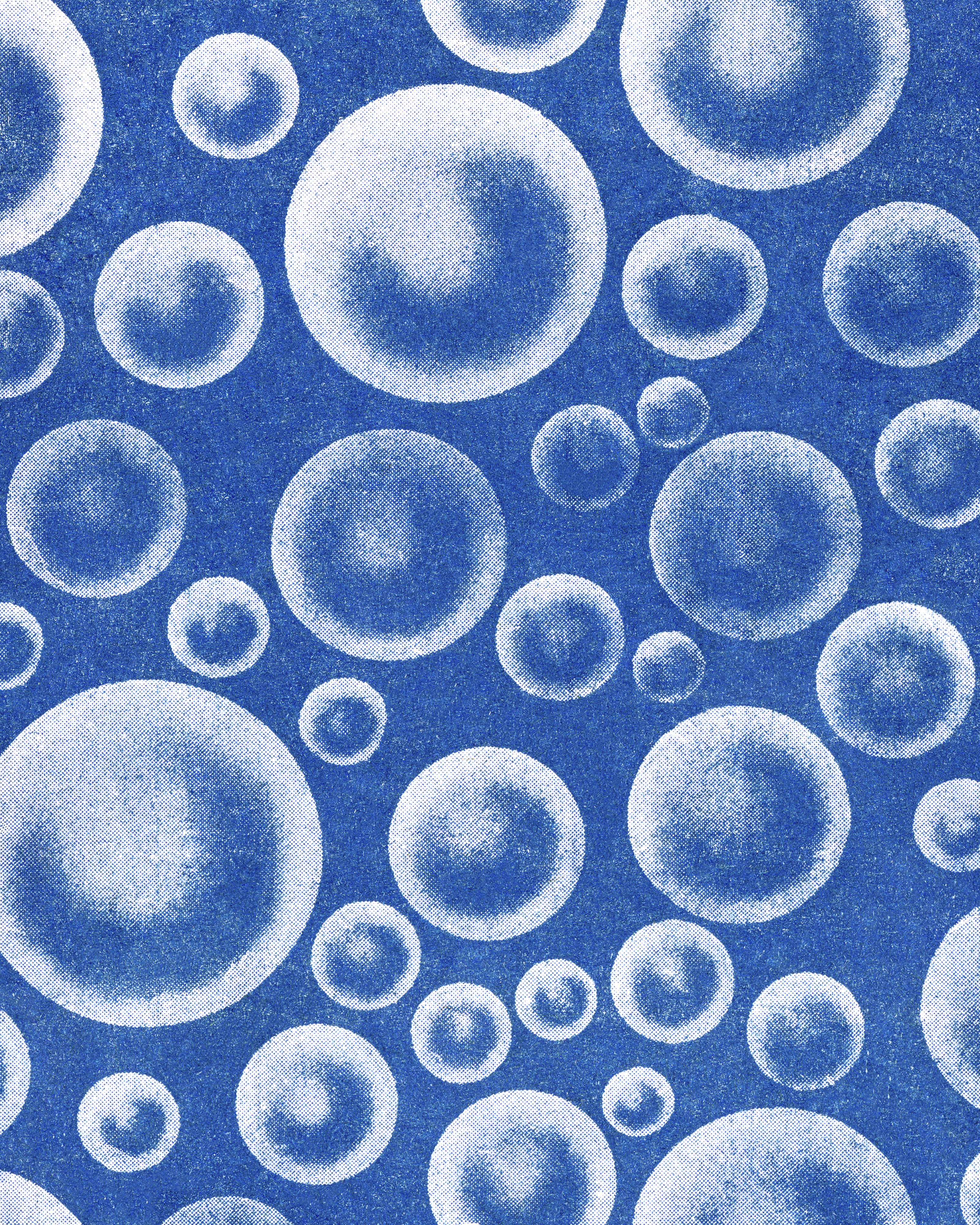 Bubbles floating on a light blue background