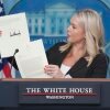 White House press secretary Karoline Leavitt holds up a tariff letter from President Trump to South Korea's President Lee Jae-myung during a press briefing at the White House on July 7.