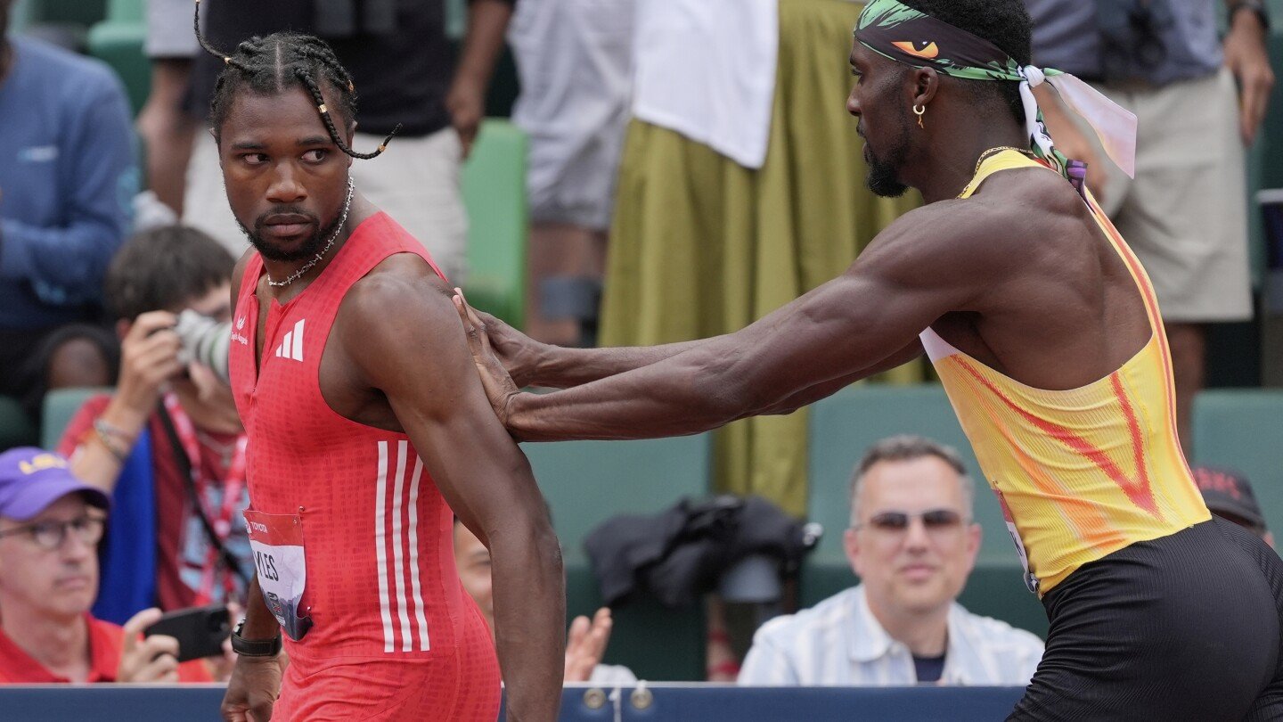 contact-on-the-track,-as-lyles-shoved-by-bednarek-after-his-win-in-200-meters-at-us-nationals