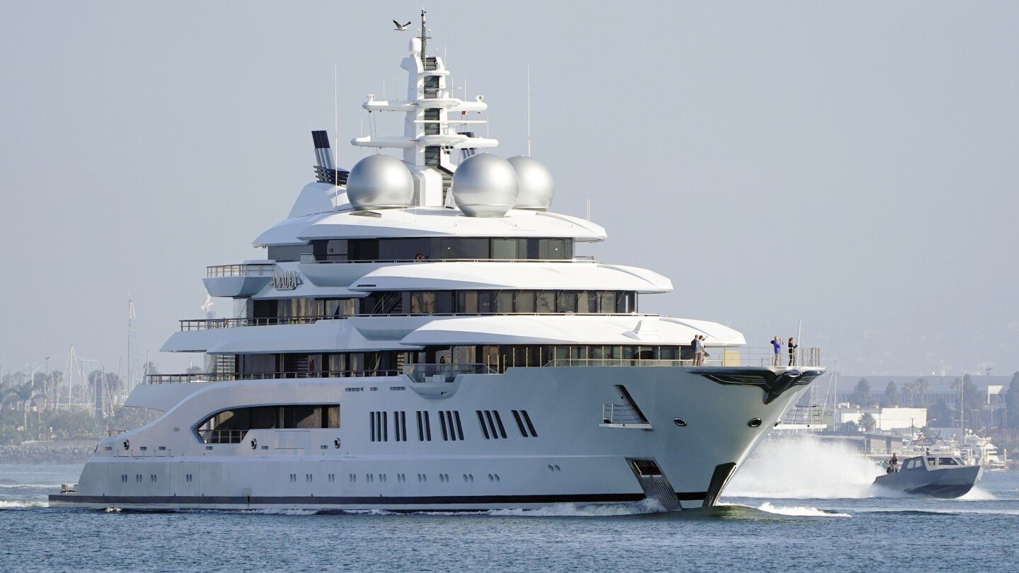 us-is-auctioning-$325m-russian-superyacht-amadea,-which-boasts-8-state-rooms,-helipad,-gym-and-spa